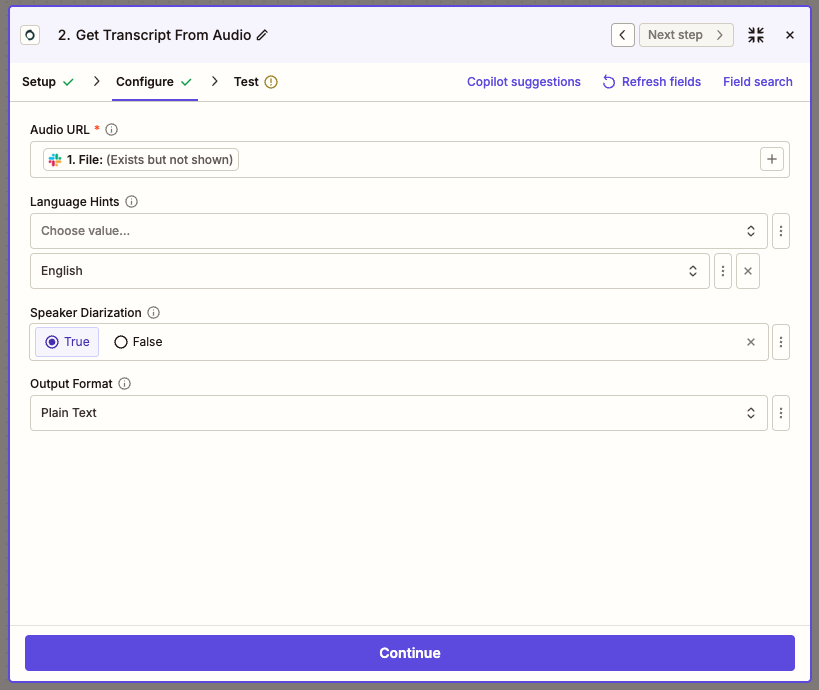Zapier editor showing the Configure tab for the Speechmatics Get Transcript from Audio action